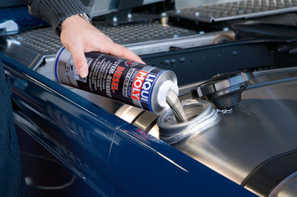 Liqui Moly 5156 Pro Line Diesel System Cleaner - being poured into truck tank